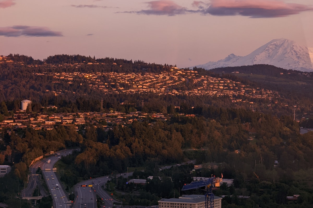Bellevue downtown high-rises with Cascade Mountains in the background